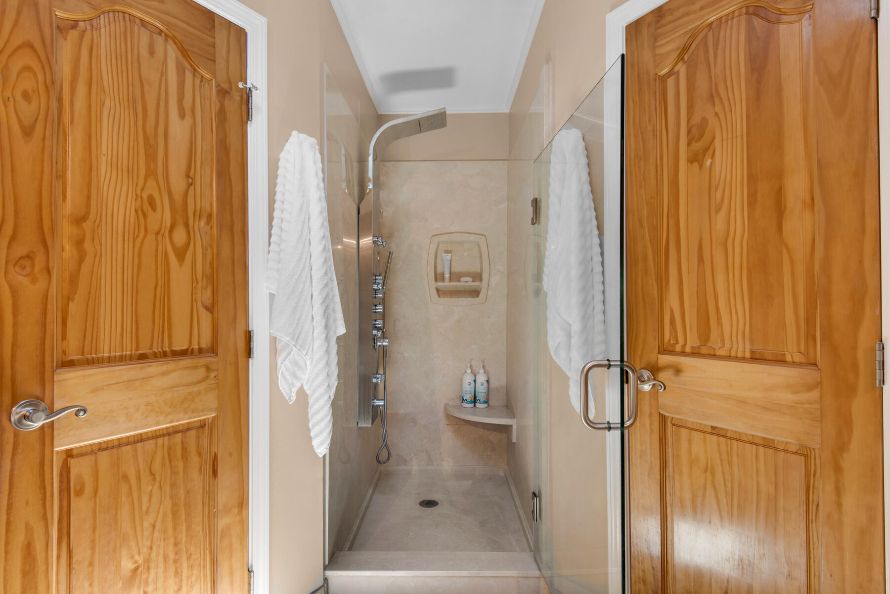 310 Antiqua Way Niceville, FL 32578 - Photo 22 of 39 a bathroom with a glass shower door