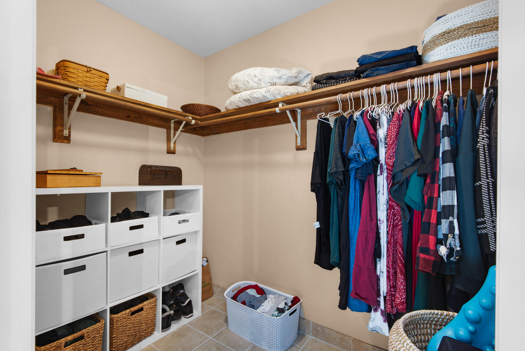 310 Antiqua Way Niceville, FL 32578 - Photo 23 of 39 a view of walk in closet with clothes and shoes