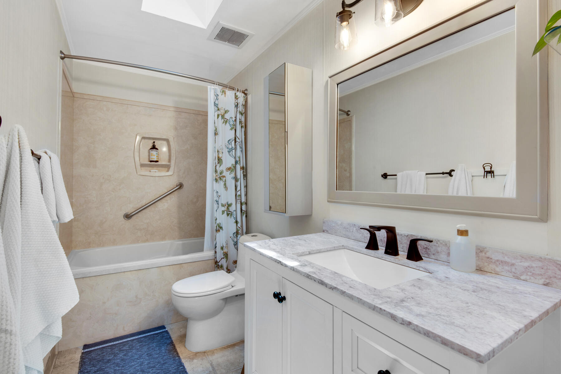 310 Antiqua Way Niceville, FL 32578 - Photo 29 of 39 a bathroom with a granite countertop sink toilet and shower