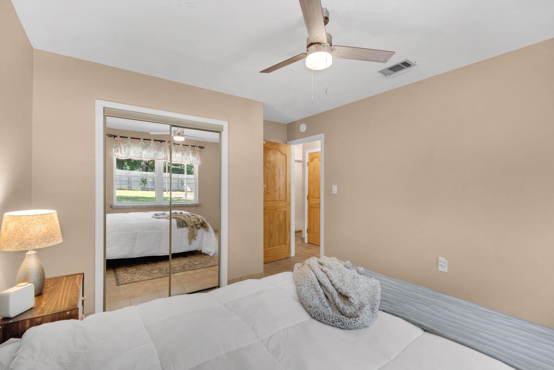 310 Antiqua Way Niceville, FL 32578 - Photo 31 of 39 a bedroom with a bed and a couch
