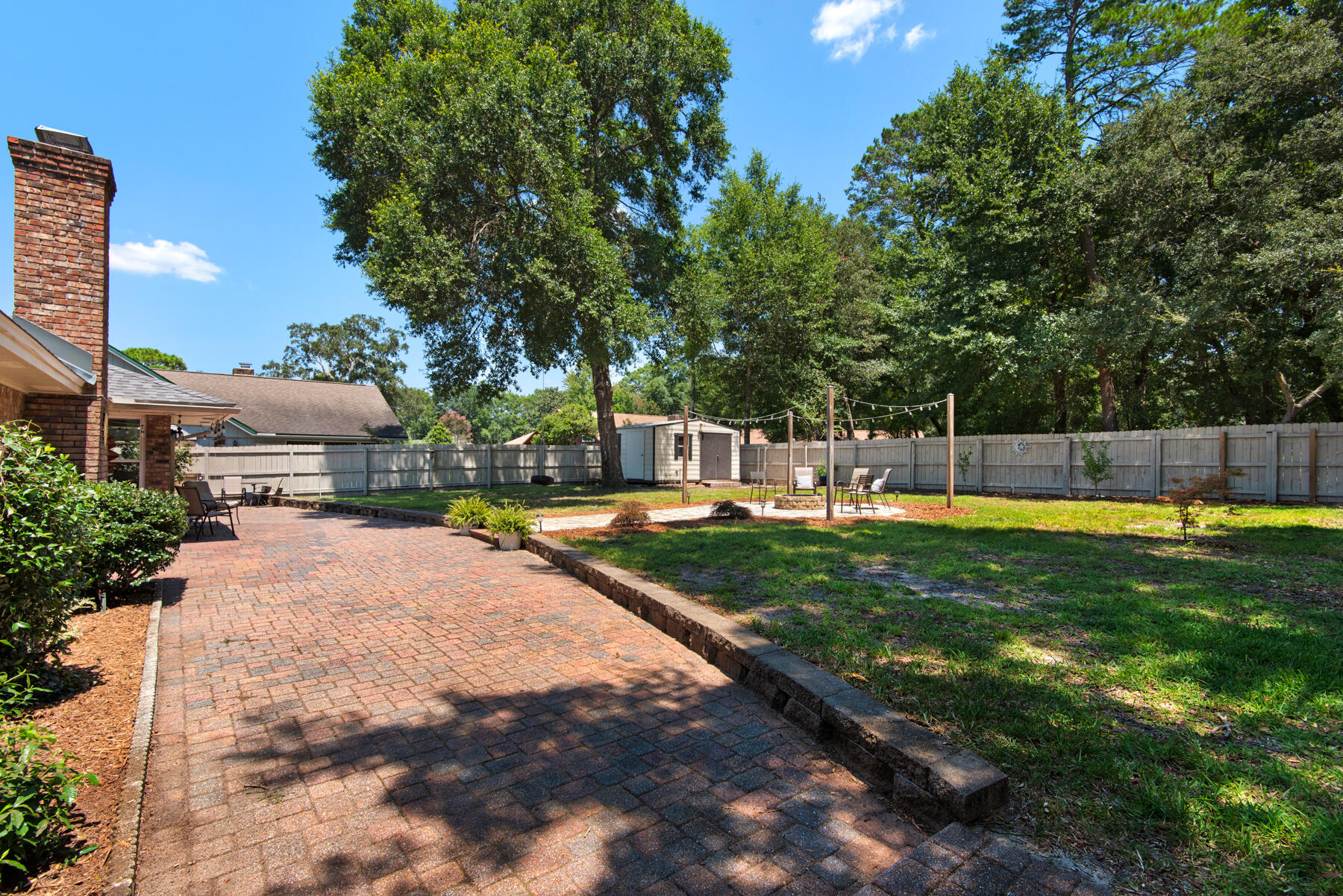 310 Antiqua Way Niceville, FL 32578 - Photo 35 of 39 a swimming pool with outdoor seating and yard