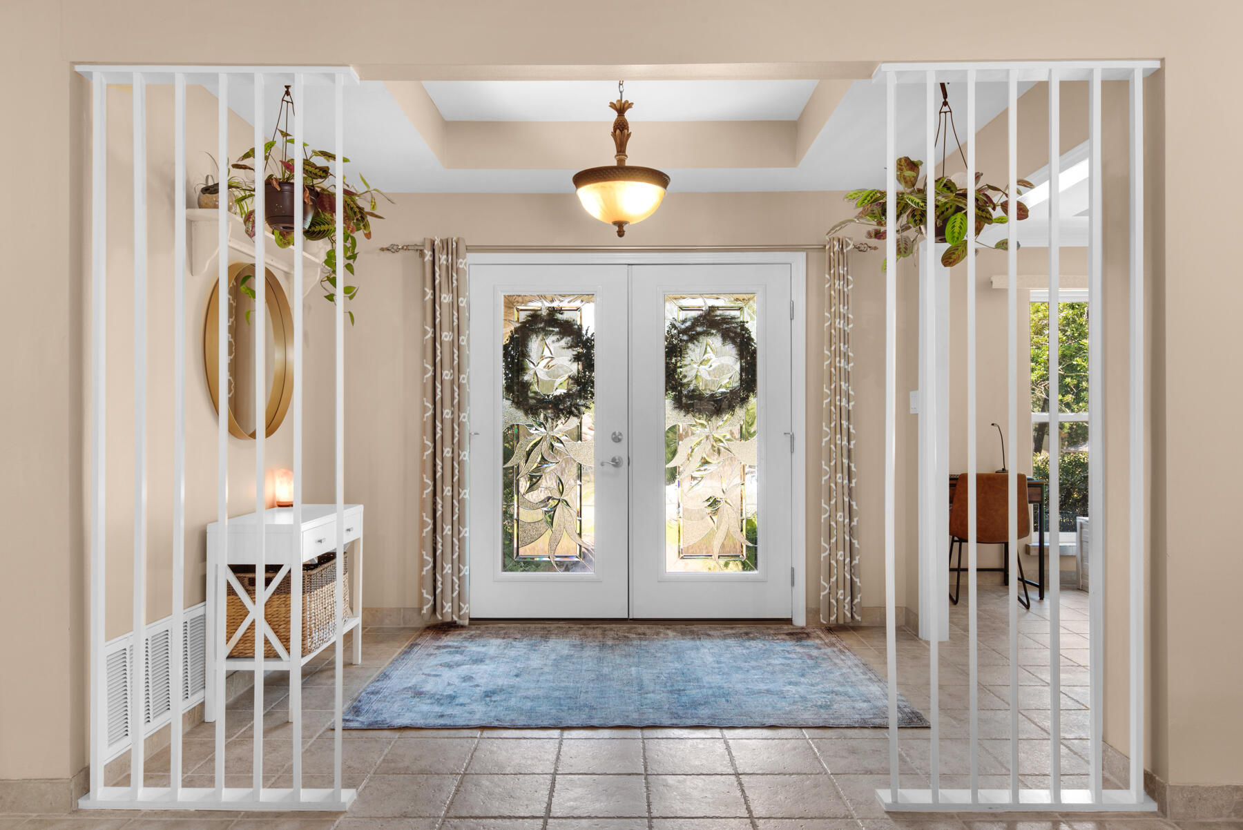 310 Antiqua Way Niceville, FL 32578 - Photo 6 of 39 a view of a hallway with wooden floor and windows