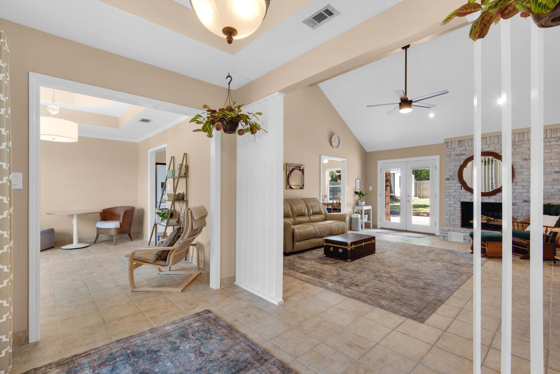 310 Antiqua Way Niceville, FL 32578 - Photo 7 of 39 a living room with furniture and a chandelier