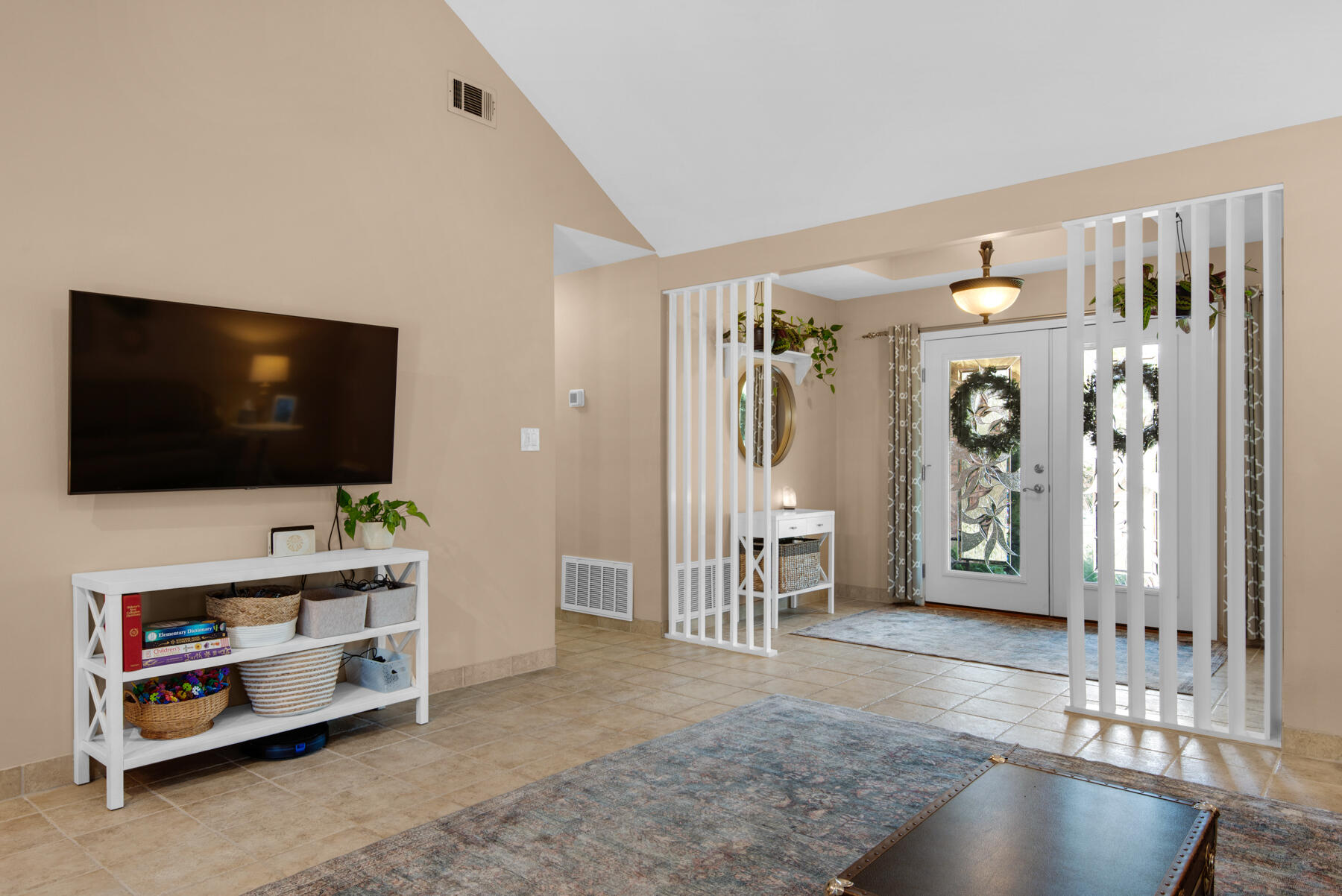310 Antiqua Way Niceville, FL 32578 - Photo 9 of 39 a living room with furniture and a flat screen tv