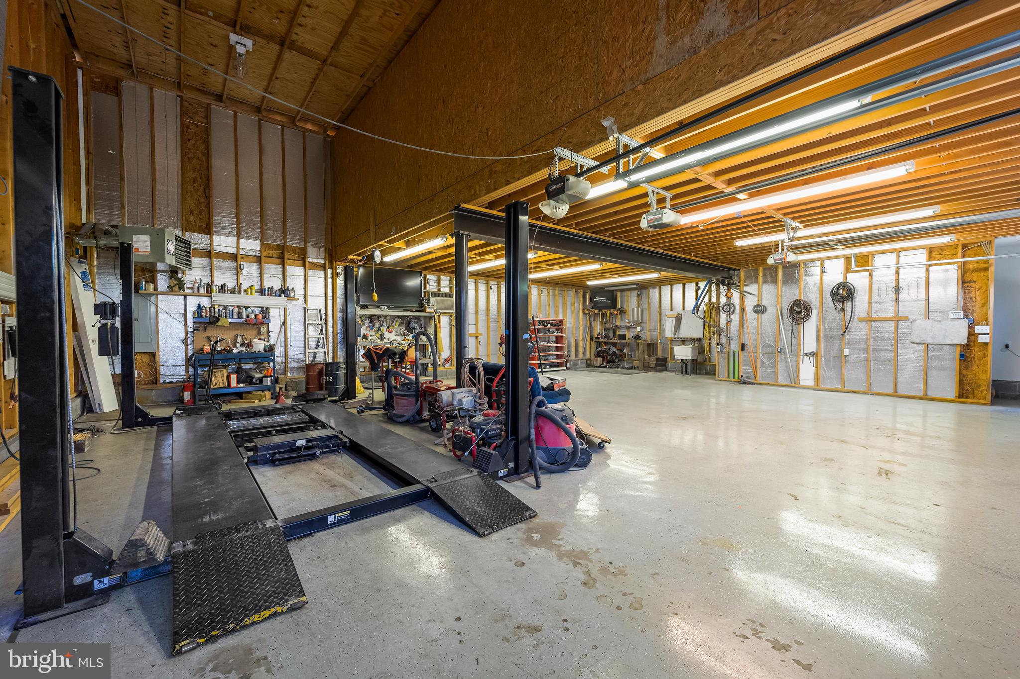 4003 Klausmier Road Nottingham, MD 21236 - Photo 8 of 43 Pro Park lift with 9,000 lb capacity & 20' ceiling