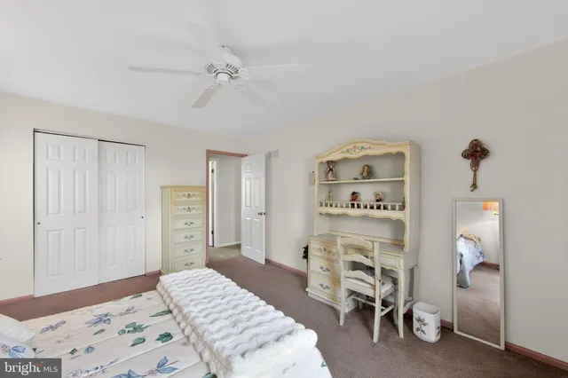 a work room with furniture and wooden floor