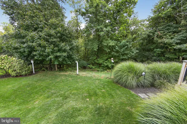 a view of a chair and fire pit in the middle of house