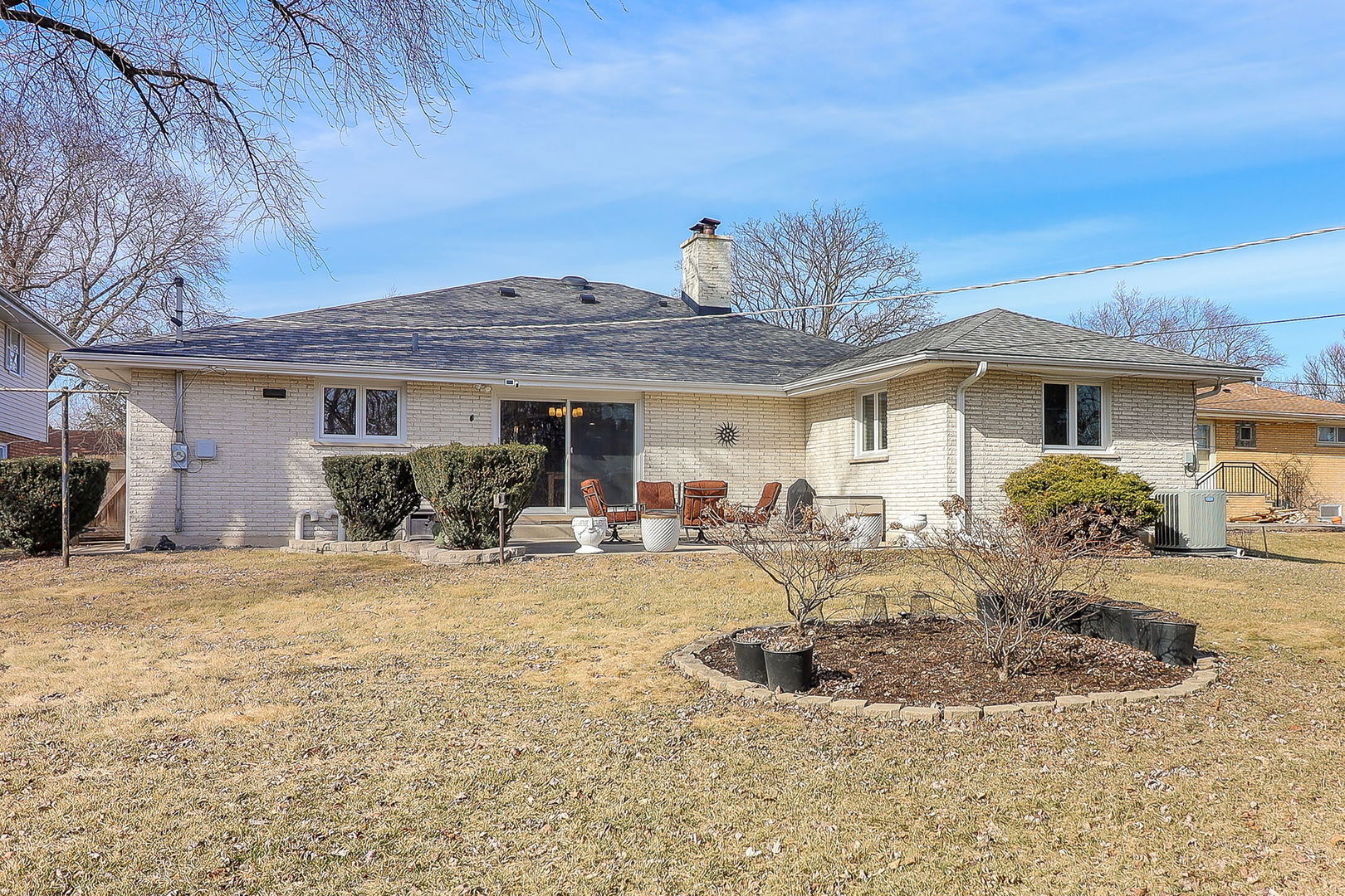 Undisclosed Address Countryside, IL 60525 - Photo 15 of 16 a view of a house with backyard and sitting area