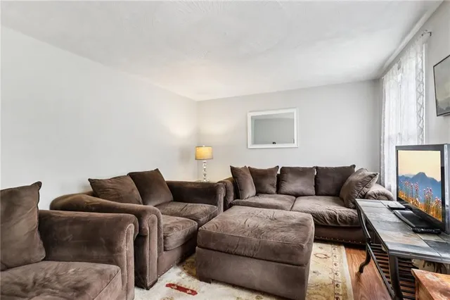 a living room with furniture and a couch