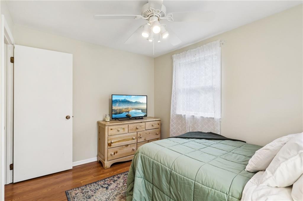 748 Four Mile Run Road Ligonier, PA 15658 - Photo 33 of 49 a bedroom with a bed and a television in it
