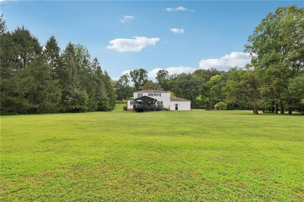 748 Four Mile Run Road Ligonier, PA 15658 - Photo 6 of 49 a view of a green field