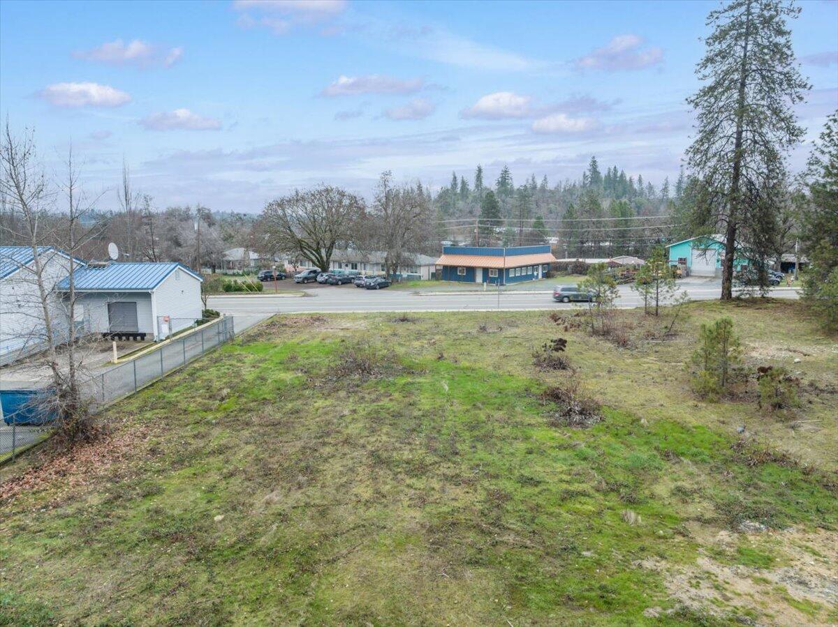 329 Merlin Road Merlin, OR 97532 - Photo 3 of 7 a view of a garden with houses