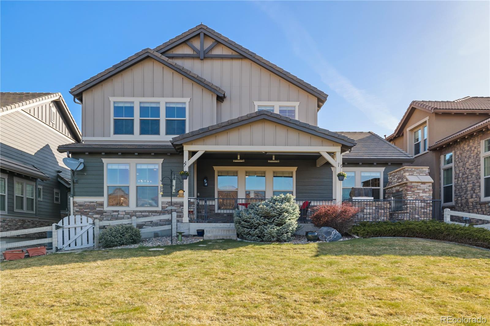 10681 Sundial Rim Road Highlands Ranch, CO 80126 - Photo 41 of 45 a front view of a house with swimming pool