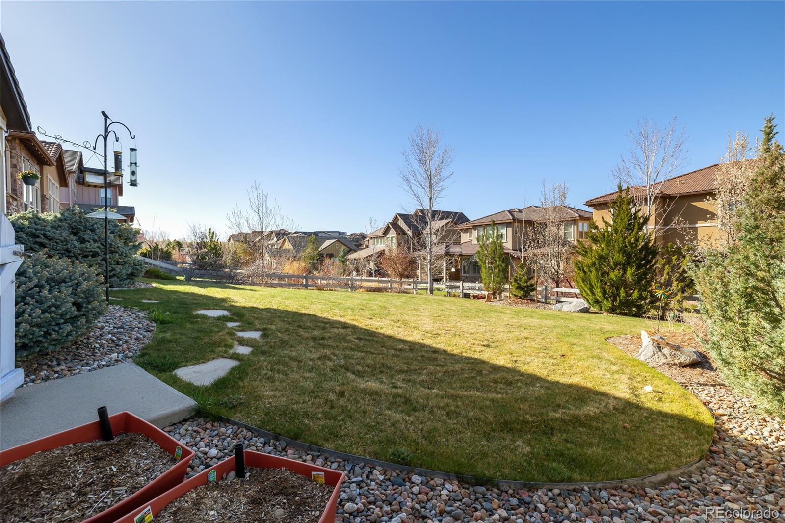 10681 Sundial Rim Road Highlands Ranch, CO 80126 - Photo 42 of 45 a view of a yard with an outdoor space