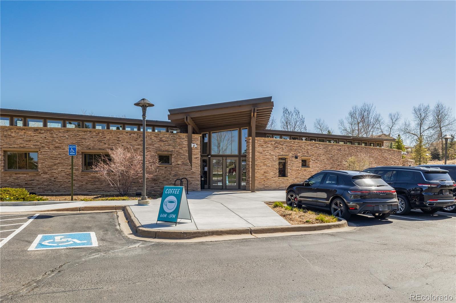 10681 Sundial Rim Road Highlands Ranch, CO 80126 - Photo 45 of 45 a car parked in front of a building