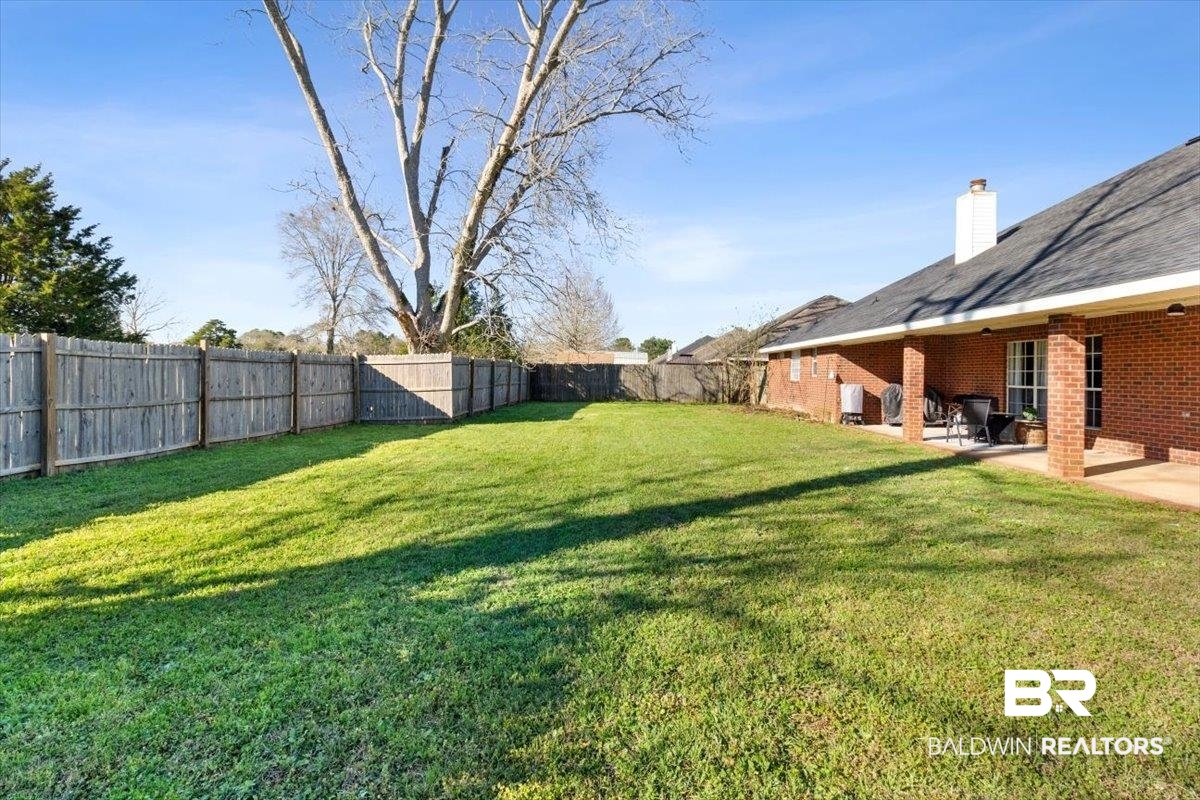 27809 Rileywood Drive Daphne, AL 36526 - Photo 29 of 38 View of yard with a patio area