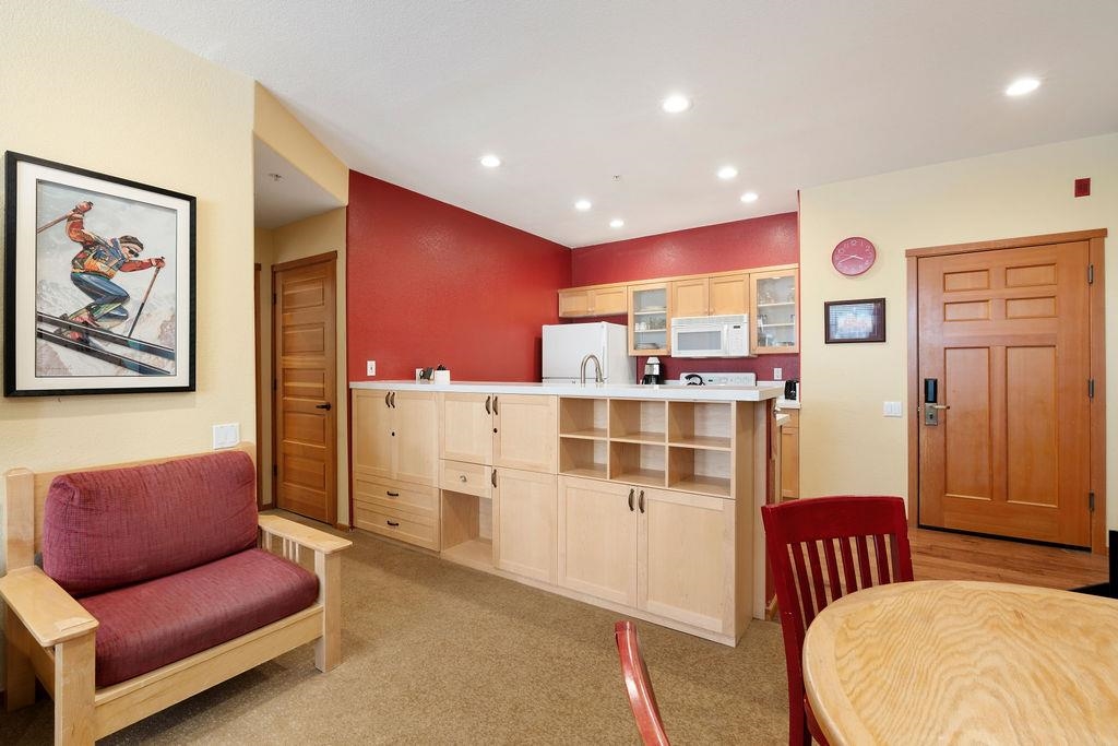 201 Shirley Cyn Road, Unit 714 Olympic Valley, CA 96146 - Photo 6 of 28 a living room with furniture