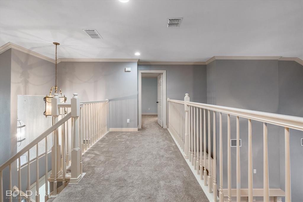 1663 Spencer Circle Benton, LA 71006 - Photo 29 of 40 a view of a hallway with stairs