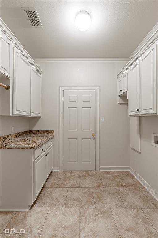 1663 Spencer Circle Benton, LA 71006 - Photo 40 of 40 a kitchen with granite countertop a sink and cabinets