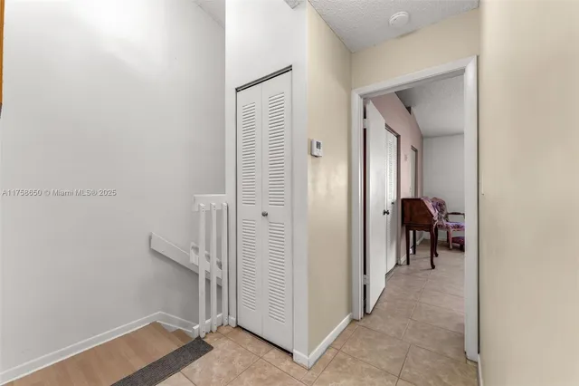 a view of a room that has a bench in it