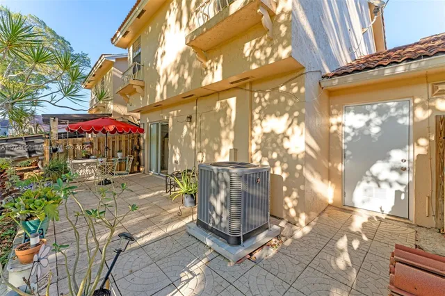 a view of path along with retail shop and buildings