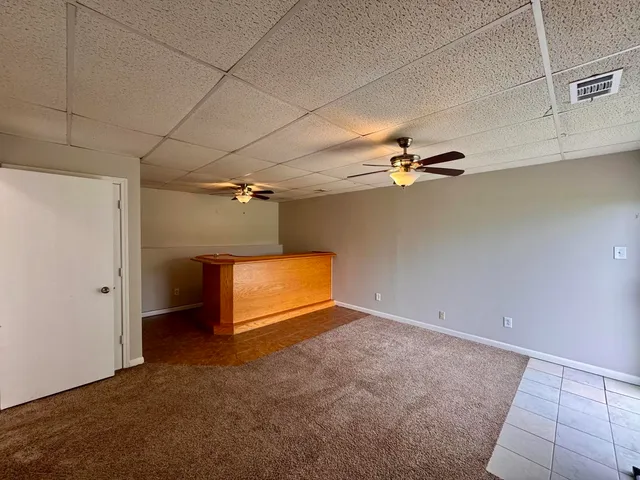 en empty room with windows