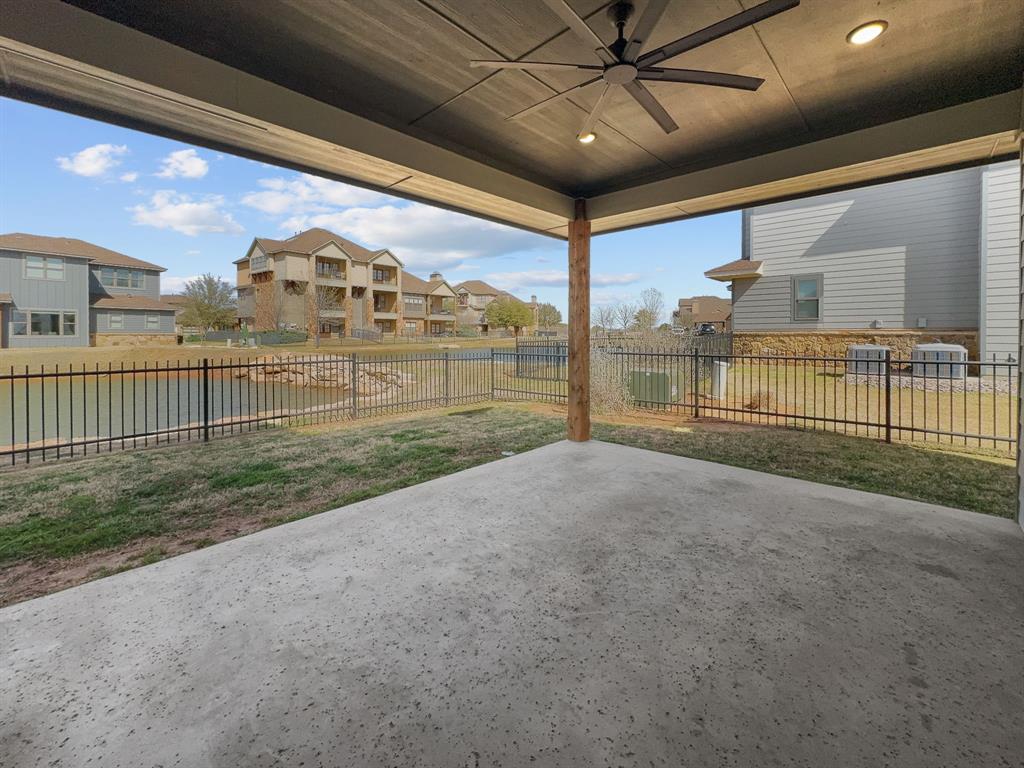 1044 Chapel Ridge Road Graford, TX 76449 - Photo 28 of 34 a view of a porch with a floor to ceiling window and stairs
