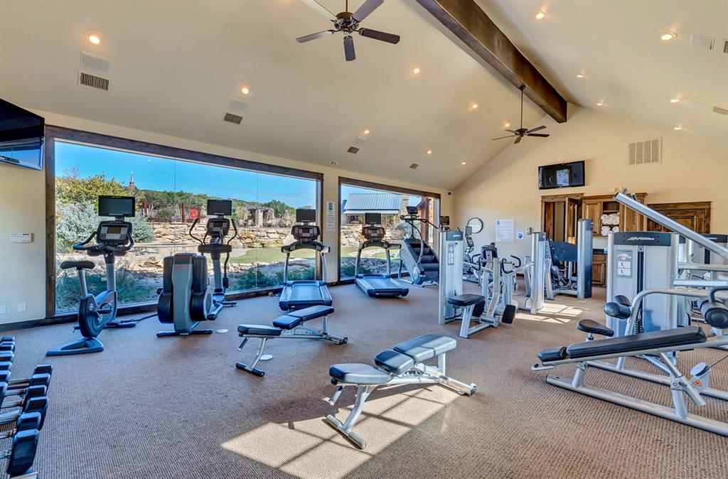 1044 Chapel Ridge Road Graford, TX 76449 - Photo 33 of 34 a view of a room with gym equipment
