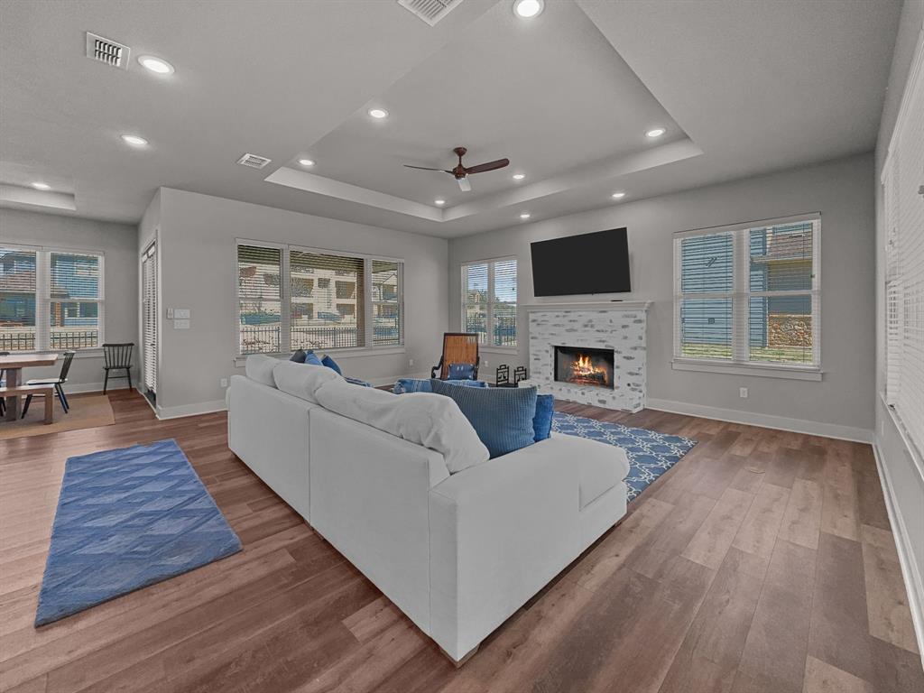 1044 Chapel Ridge Road Graford, TX 76449 - Photo 5 of 34 a living room with fireplace furniture and a flat screen tv