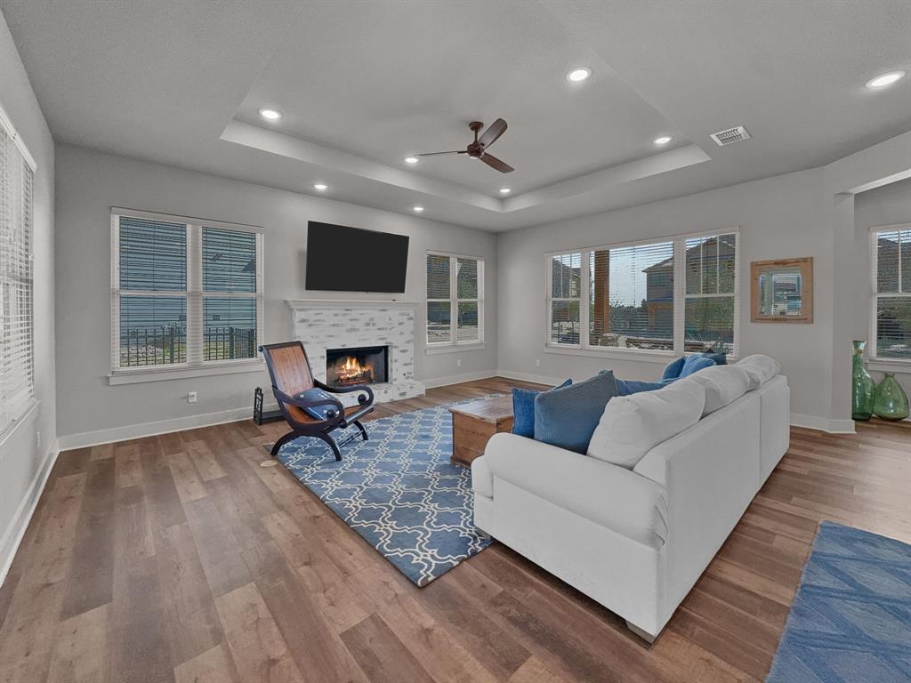 1044 Chapel Ridge Road Graford, TX 76449 - Photo 6 of 34 a living room with furniture and a fireplace