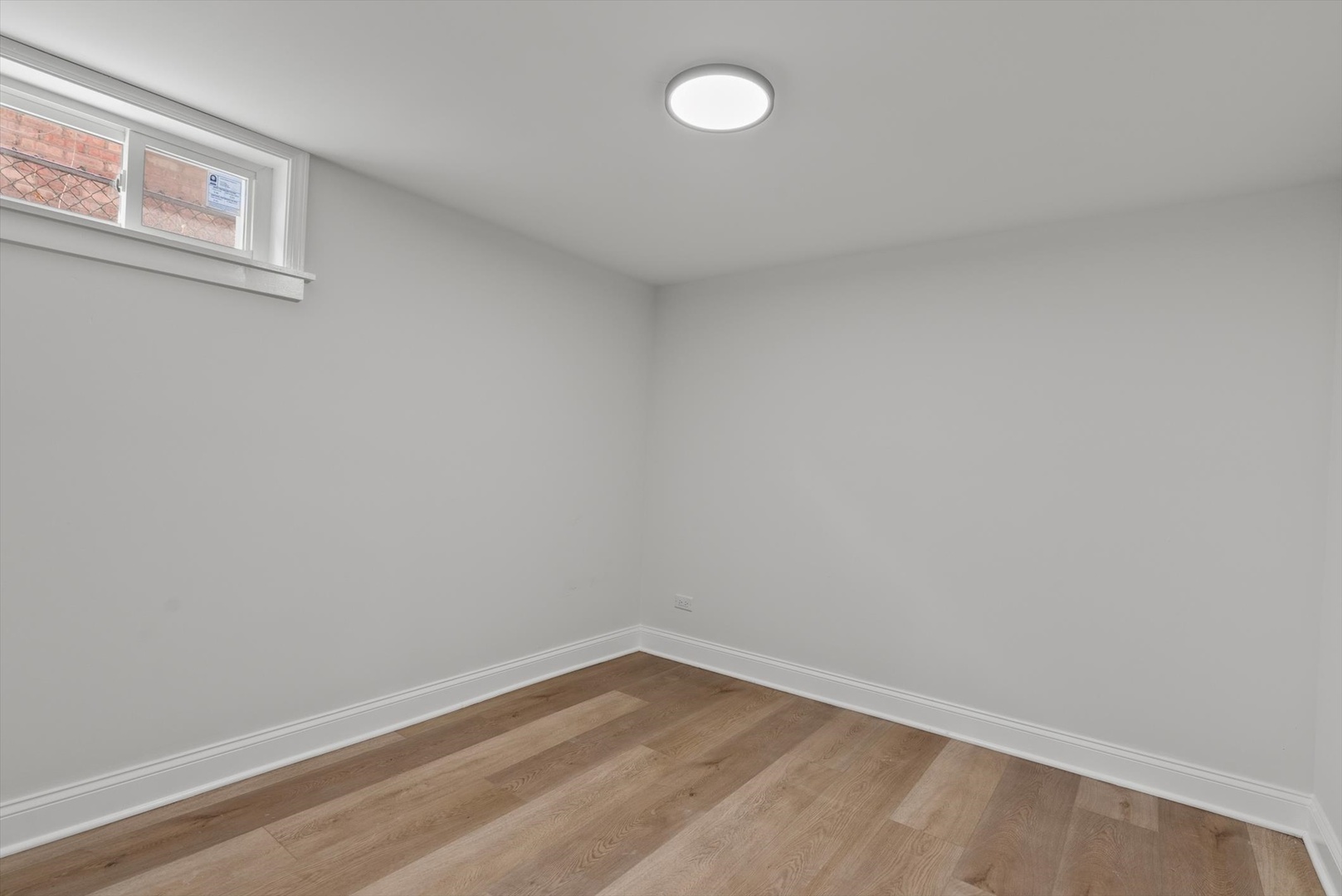 3735 169th Street Country Club Hills, IL 60478 - Photo 11 of 17 a view of an empty room with a window