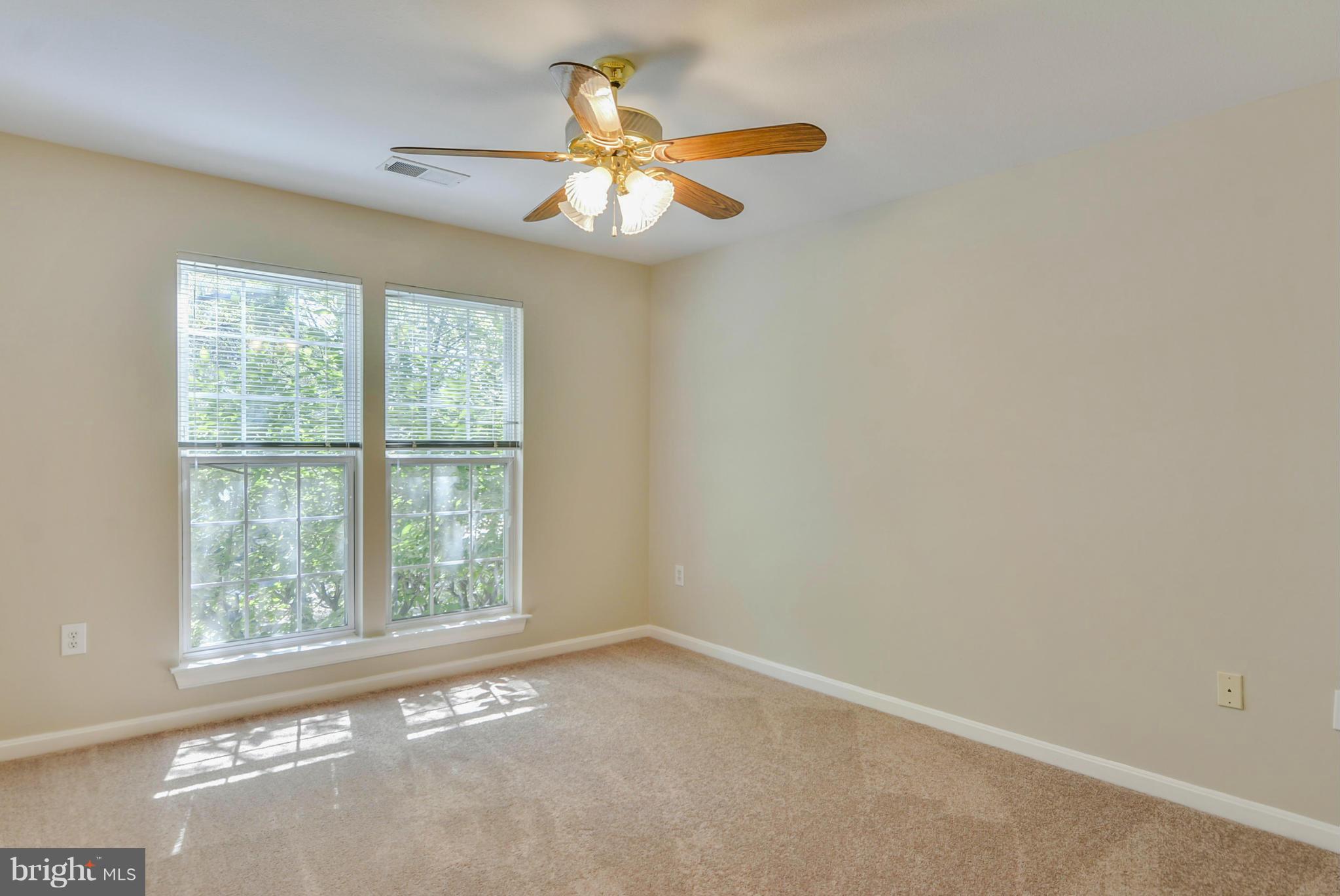 110 Booth Street, Unit 28 Gaithersburg, MD 20878 - Photo 15 of 30 an empty room with a window
