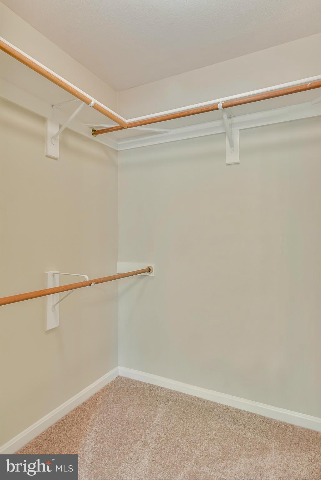 110 Booth Street, Unit 28 Gaithersburg, MD 20878 - Photo 8 of 30 a view of a room with racks on the wall