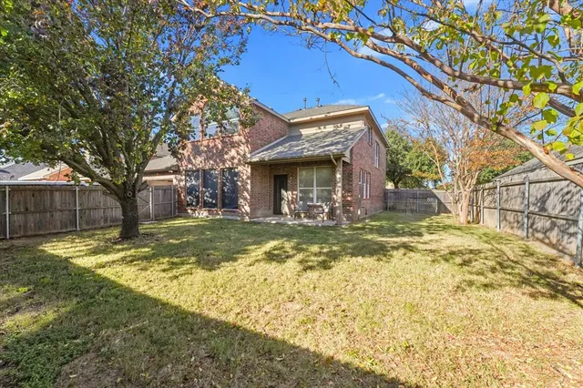 a view of a house with swimming pool