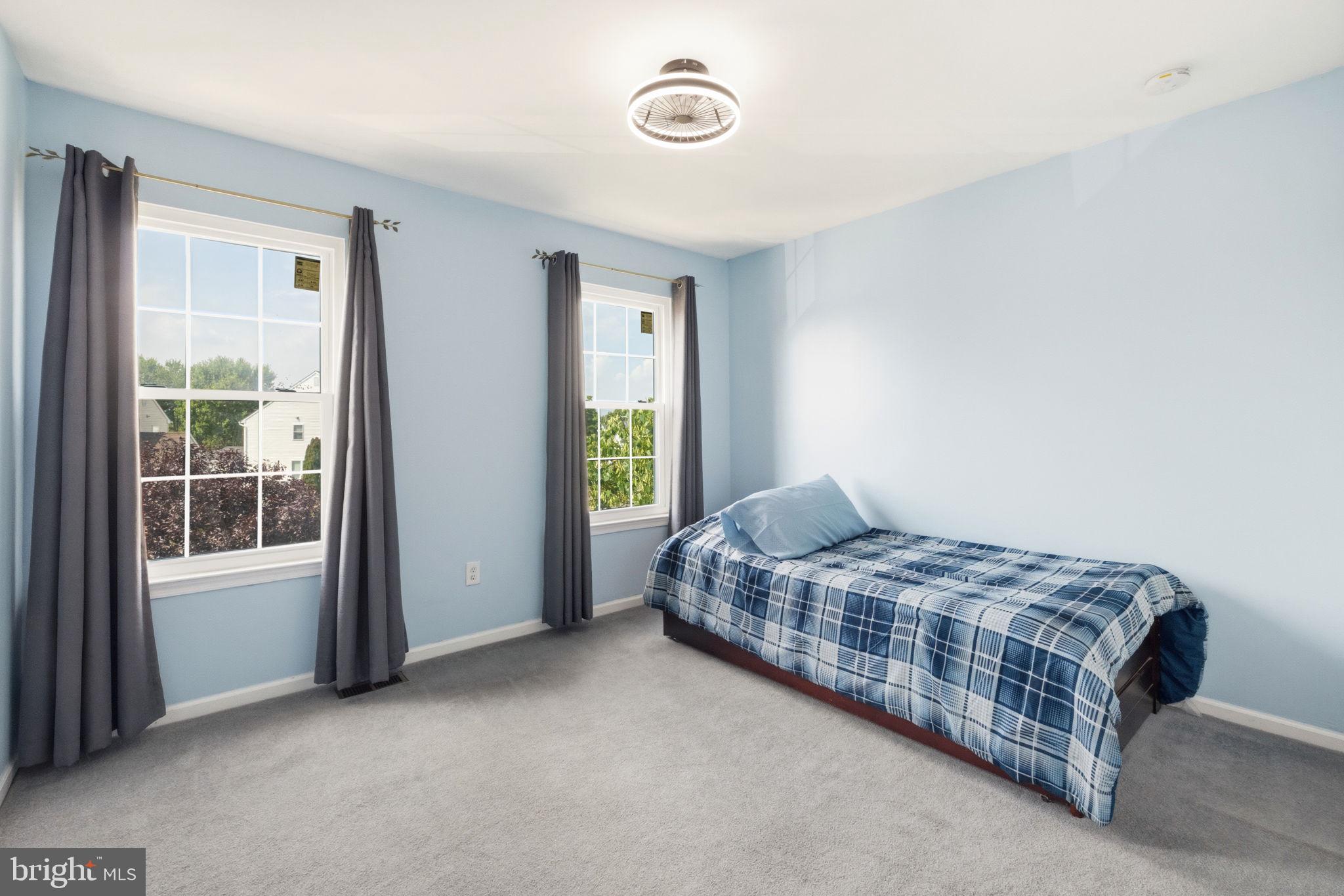 17 Paddock Road Marlton, NJ 08053 - Photo 36 of 54 Serene blue bedroom with natural light.