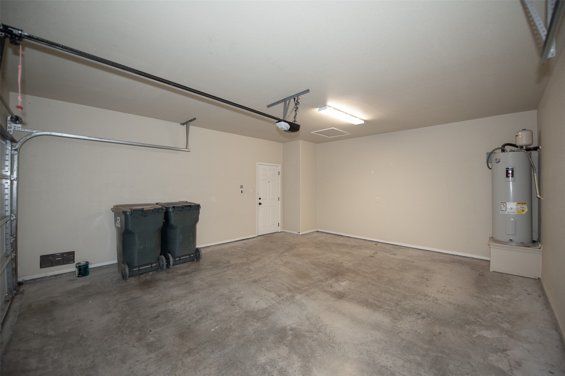 245 Joanne Loop, Unit B Buda, TX 78610 - Photo 33 of 33 Each side has its own FULL 2 car garage and private entry inside the unit.