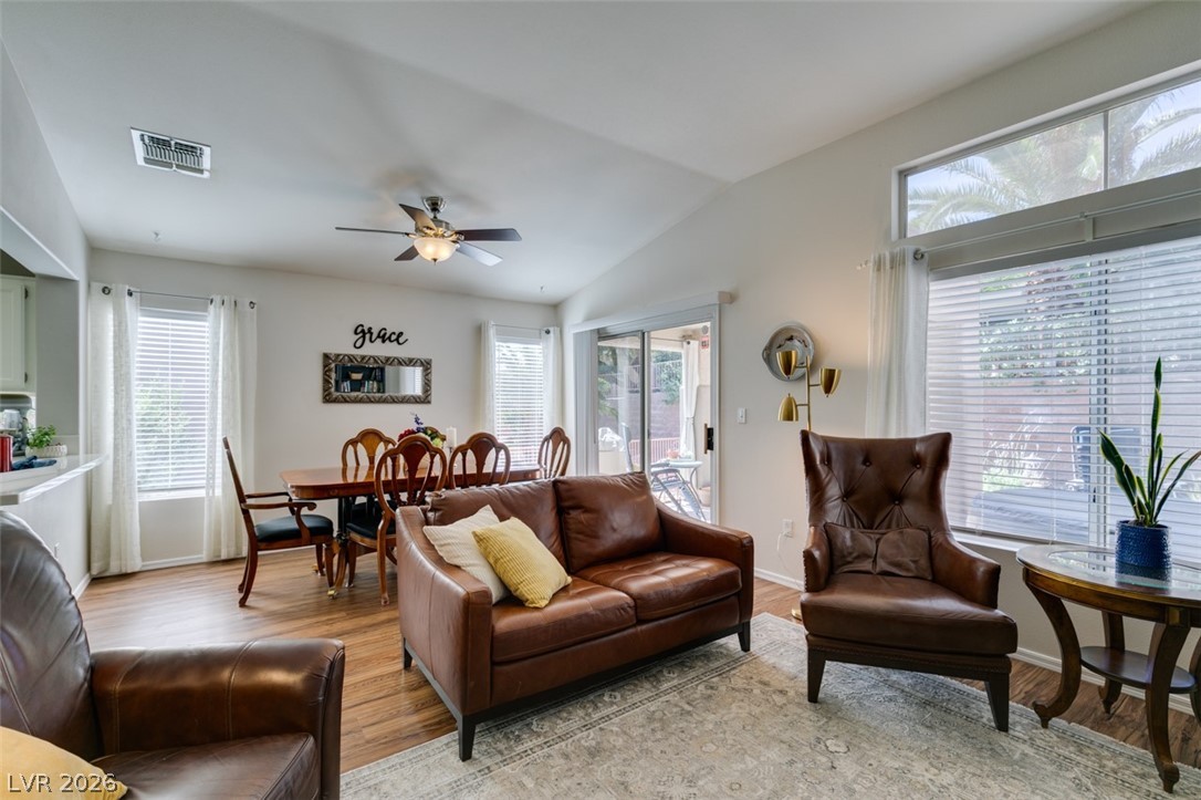 2187 Chapman Ranch Drive Henderson, NV 89012 - Photo 4 of 26 This inviting living area features warm wood flooring and an abundance of natural light.