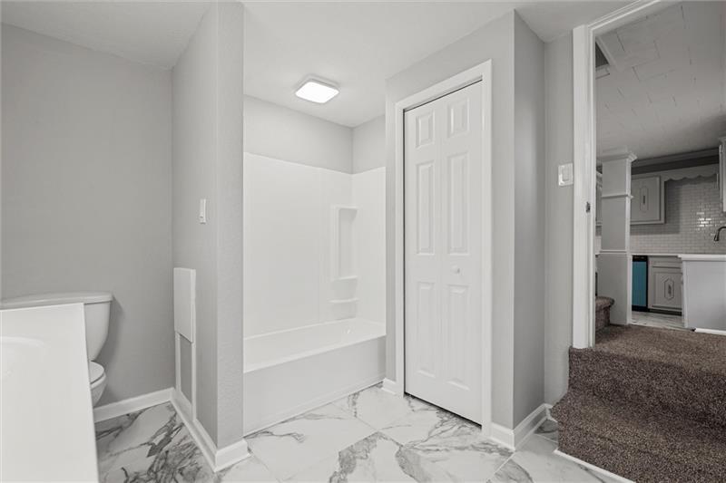 803 Little Deer Creek Valley Road Russellton, PA 15076 - Photo 16 of 46 a view of a bathroom with a glass door and shower