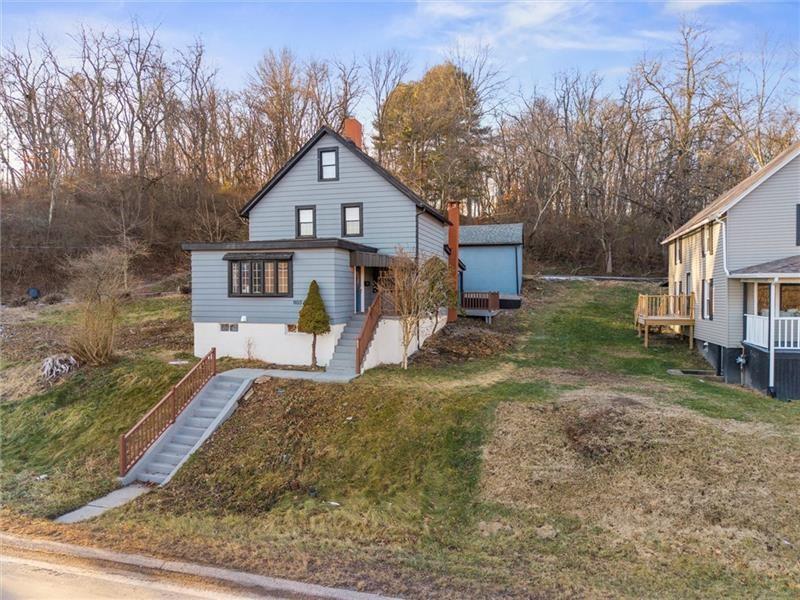 803 Little Deer Creek Valley Road Russellton, PA 15076 - Photo 32 of 46 a view of a house with a yard