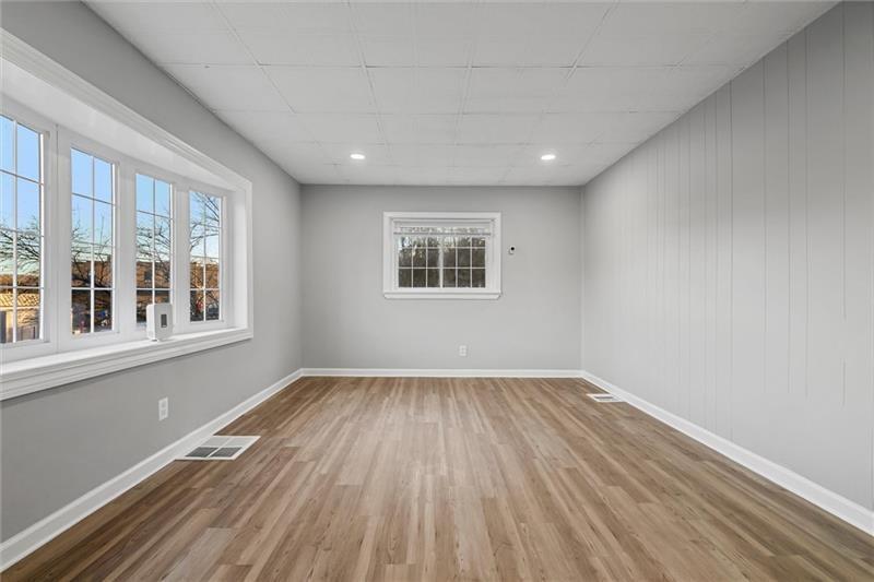 803 Little Deer Creek Valley Road Russellton, PA 15076 - Photo 5 of 46 a view of a room with wooden floor and windows