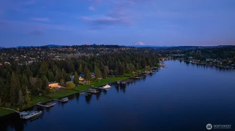 a view of a lake with a yard