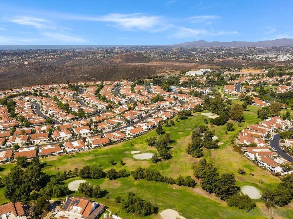 4214 Lindos Way Oceanside, CA 92056 - Photo 7 of 18 an aerial view of residential houses with outdoor space