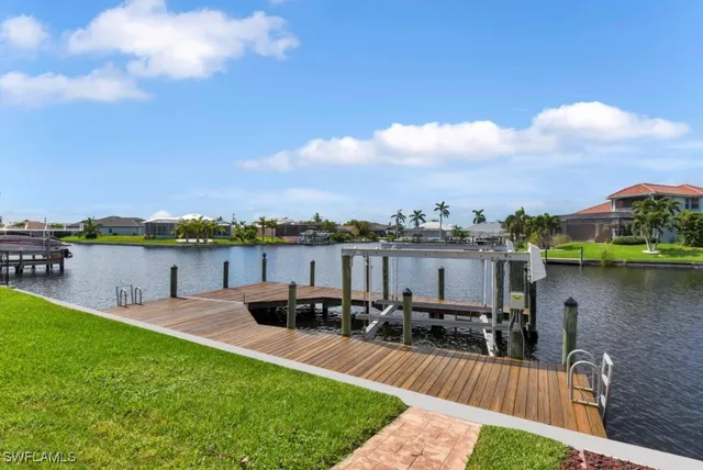 a view of a garden with a lake view