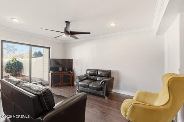 7 Tracey Court Howell, NJ 07731 - Photo 11 of 20 a living room with furniture a ceiling fan and a window