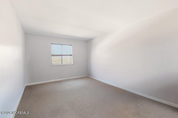 7 Tracey Court Howell, NJ 07731 - Photo 15 of 20 an empty room with a window