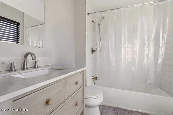 7 Tracey Court Howell, NJ 07731 - Photo 18 of 20 a bathroom with a sink a toilet and shower