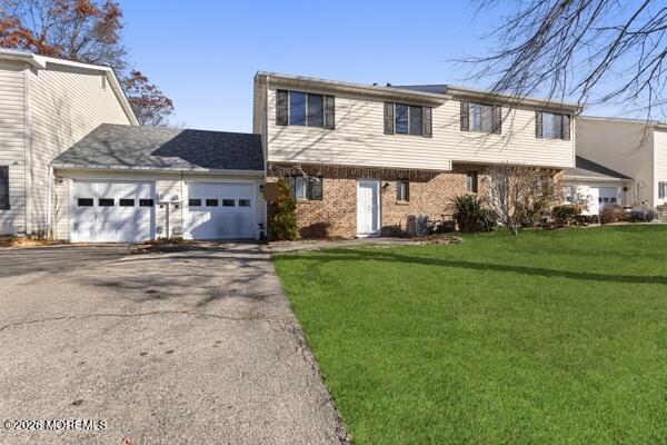 7 Tracey Court Howell, NJ 07731 - Photo 4 of 20 a front view of a house with a yard