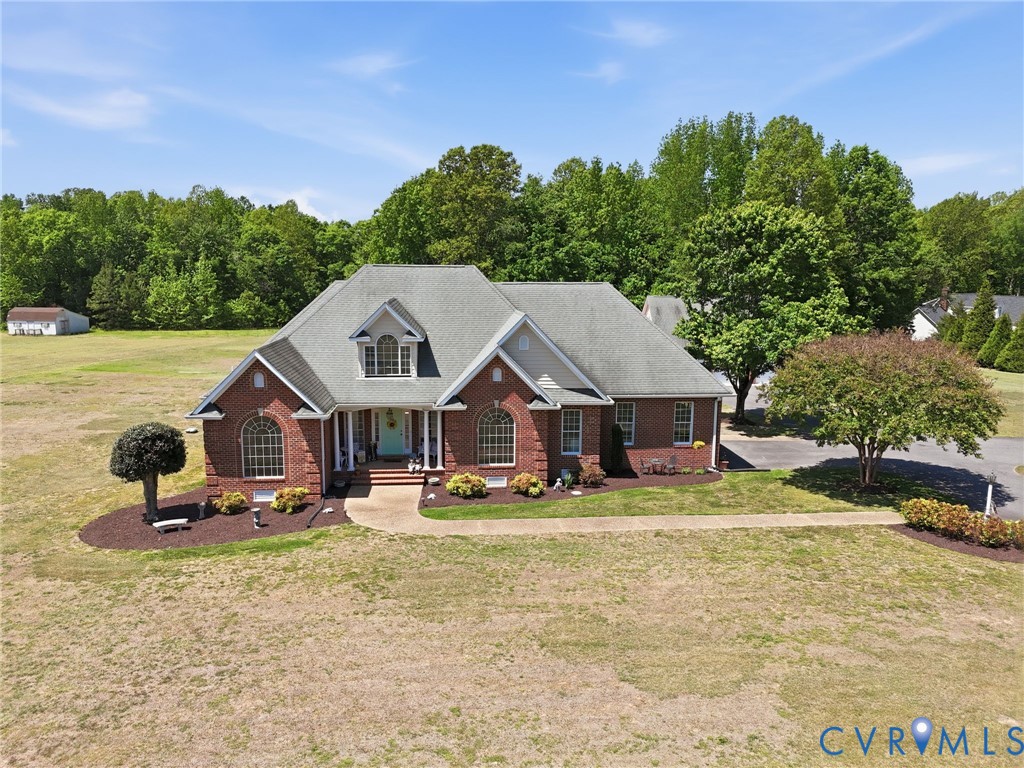 15441 Goshen Road Montpelier, VA 23192 - Photo 41 of 47 a view of a house with swimming pool and sitting area