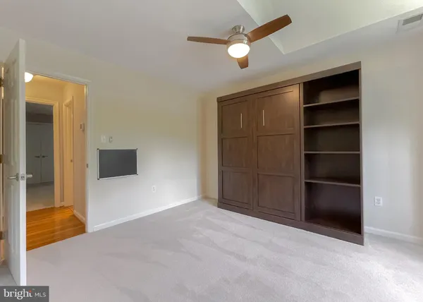 a view of empty room with an entryway
