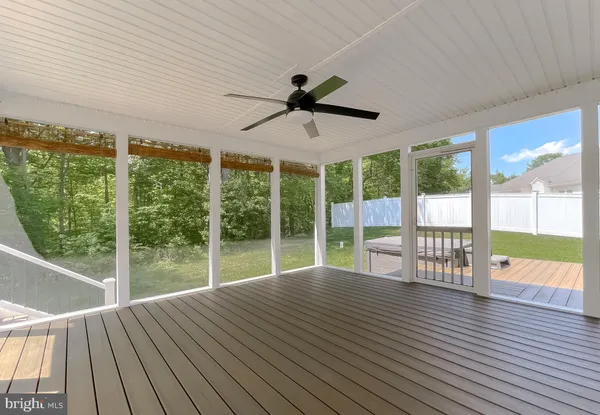 a room with a desk and chair